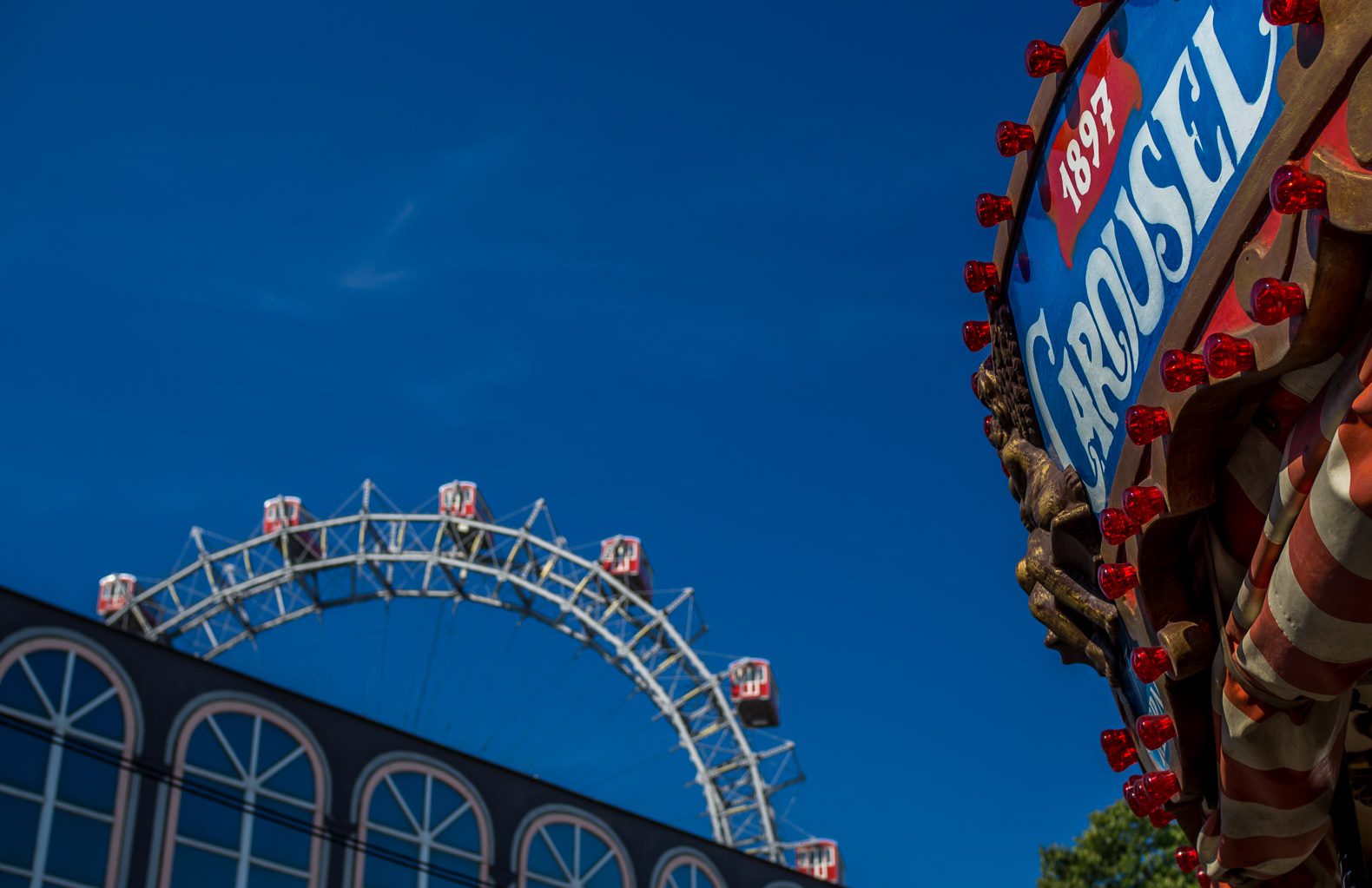 The Ferris Wheel and a Merry-Go-Round at the Prater in Vienna