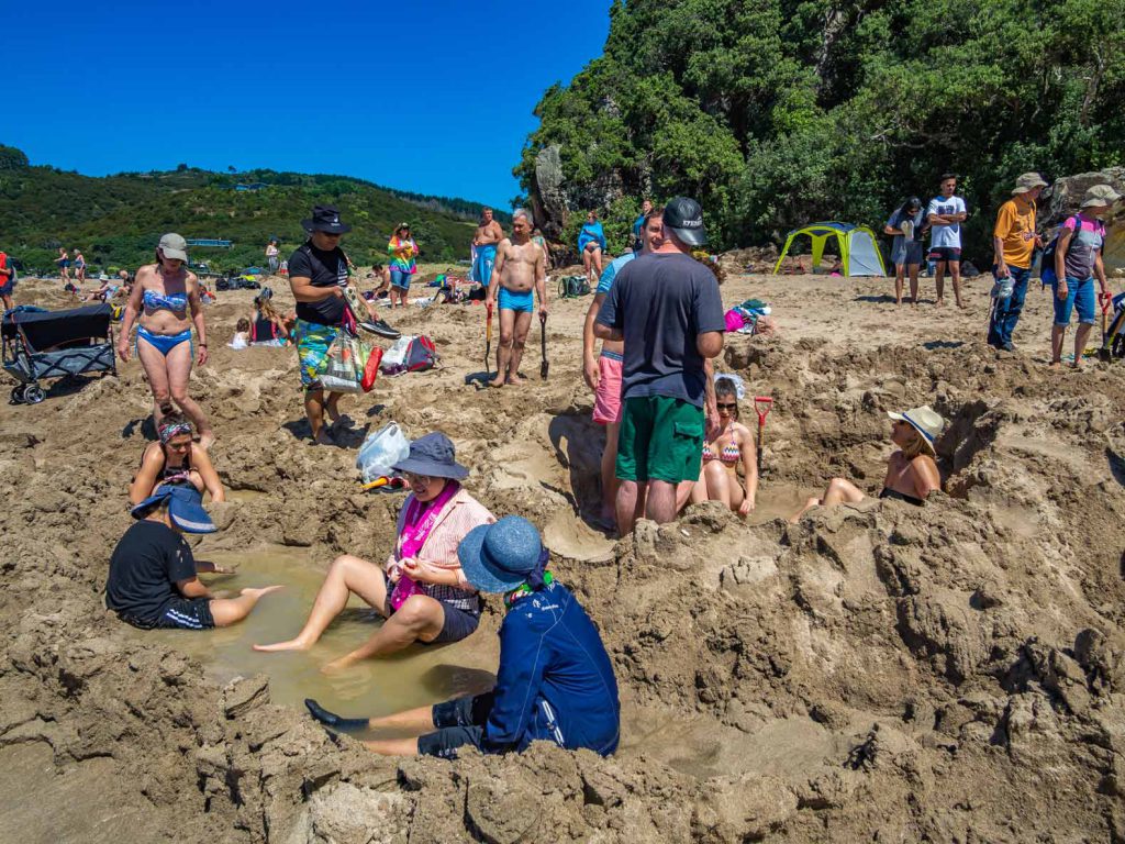 Busy pools at Hot Water Beach on the North Island of New Zealand