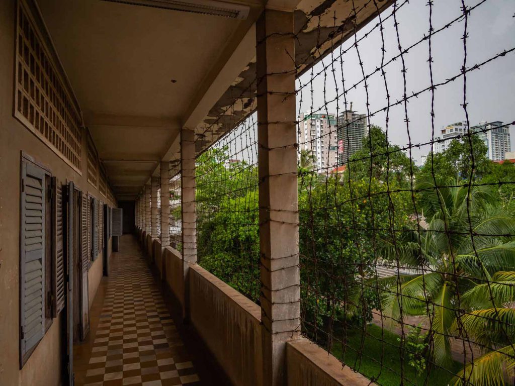 A barbed wired corridor at Tuol Sleng Genocide Museum