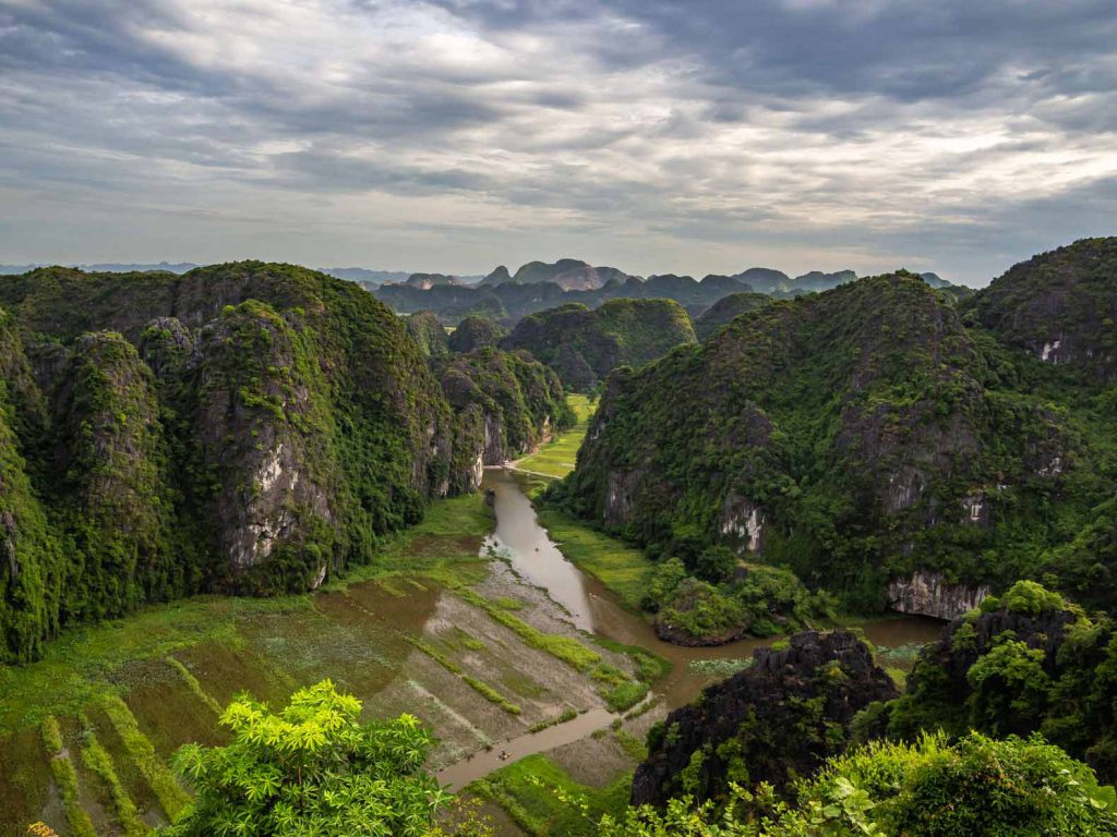 The Tam Coc river (as you see, the rice was already harvested here when we visited)