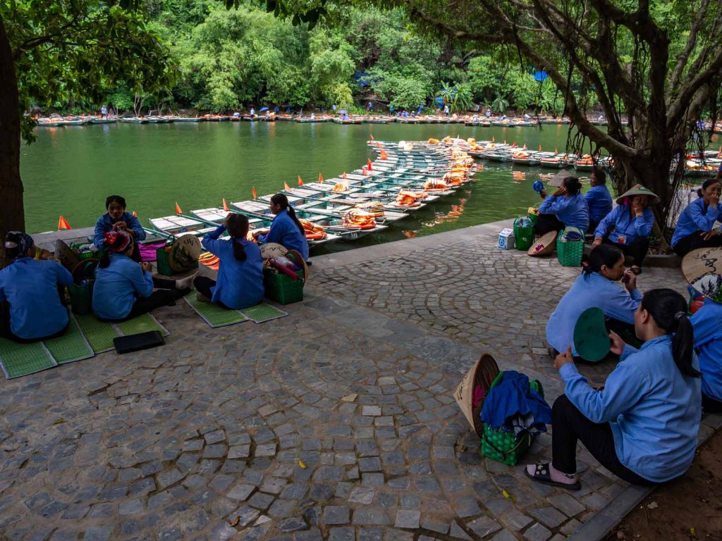 Trang An rowers waiting on their next ride