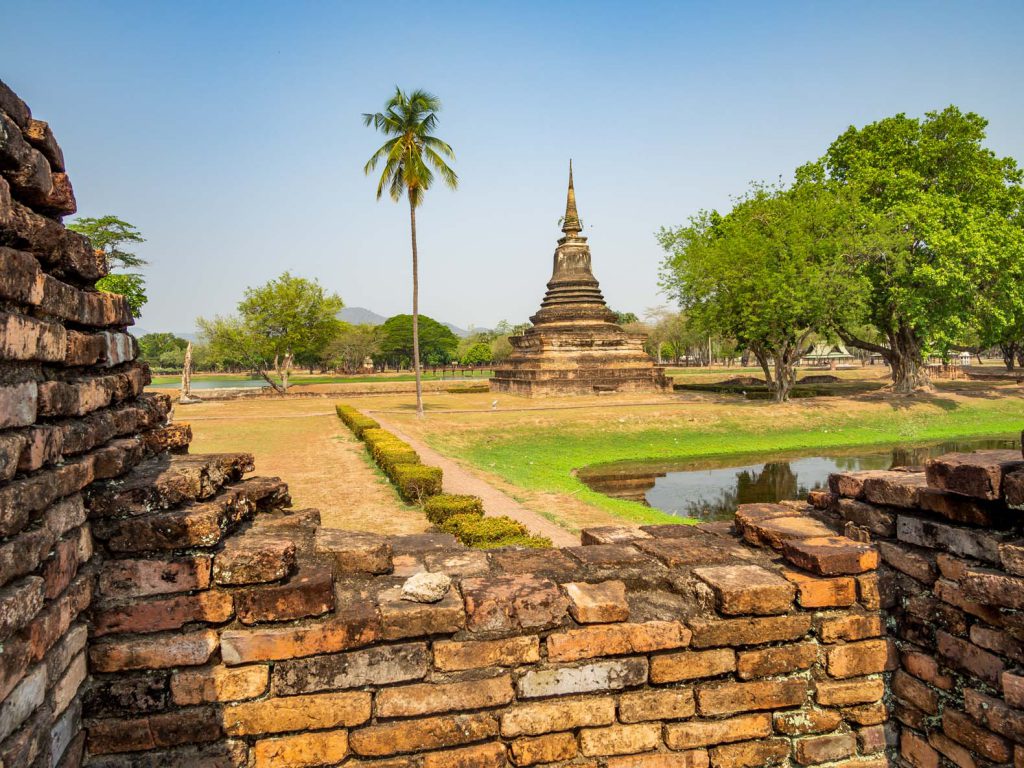 Brick wall and stupa at the Sukhothai historical park