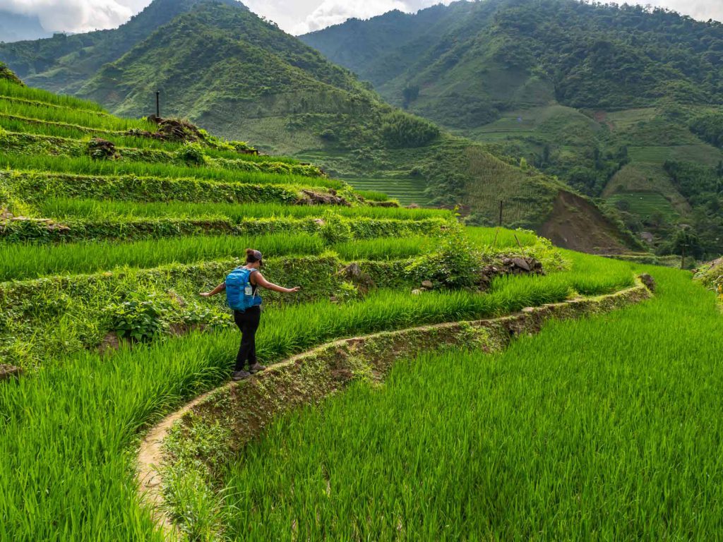 Walking through the rice fields during our Sapa trekking