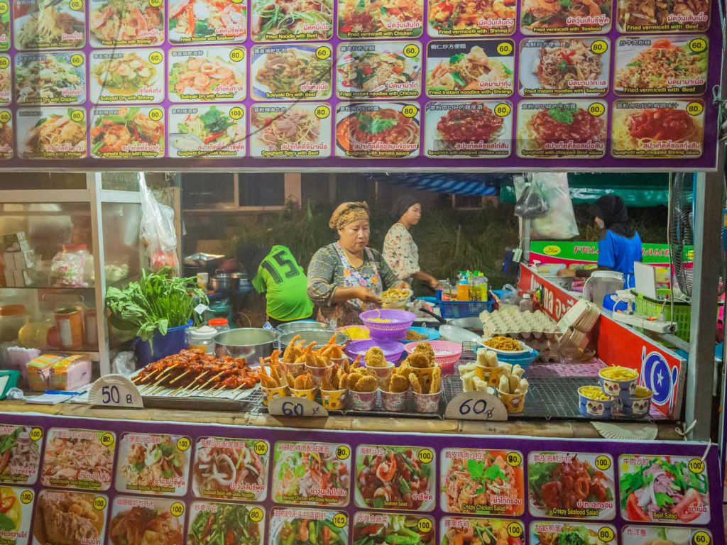 Food market stall with lots of yummy Thai dishes on offer