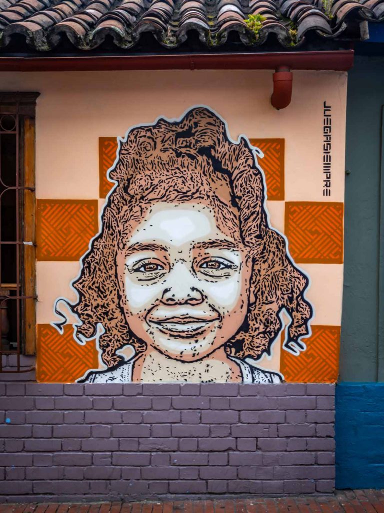 Graffiti in Bogota (Colombia), stencil image of a girl