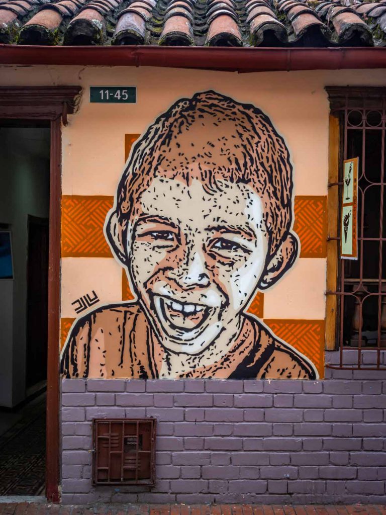 Urban art in Bogota (Colombia), stencil image of a boy