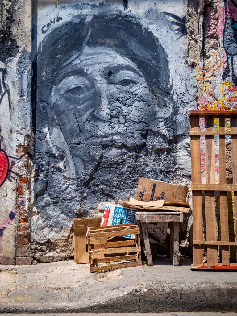 Half hidden street art in Cartagena, Colombia